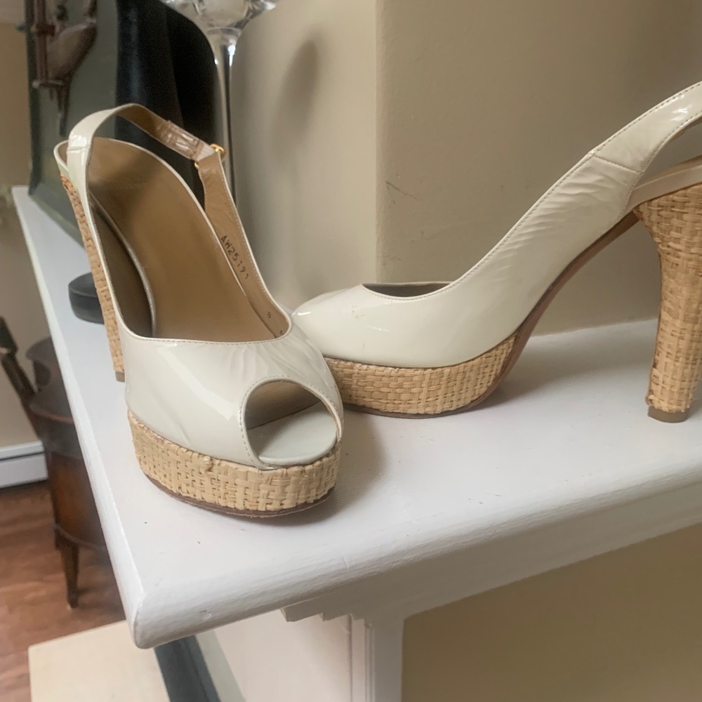 Michael Kors Cream Patent Leather and woven rafia peep toe pumps